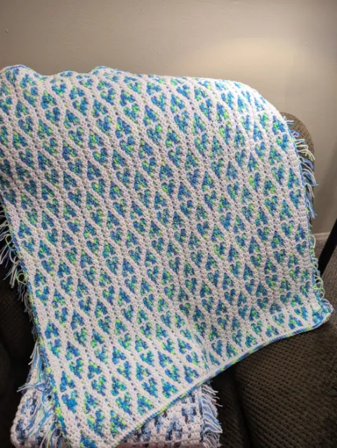 Mosaic fringed baby blanket
