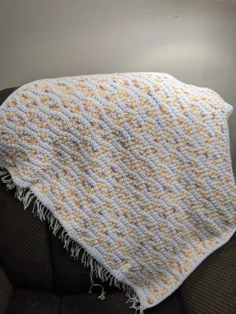 Mosaic fringed baby blanket