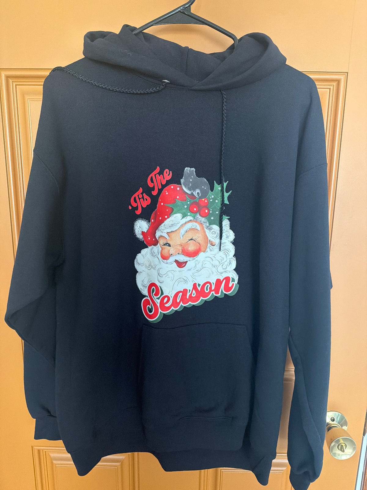 Large, black hooded sweat