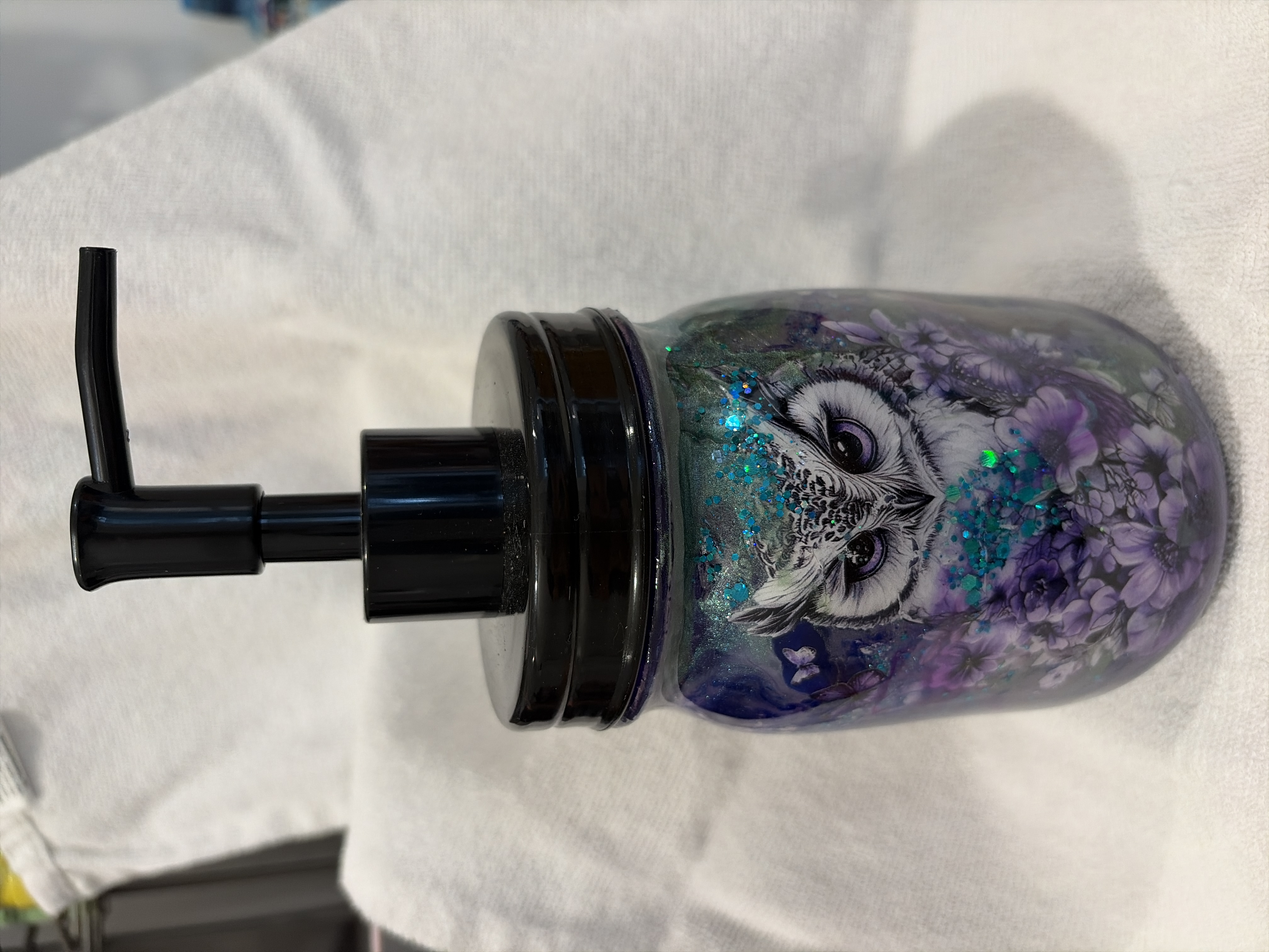Owl soap dispenser.